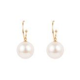 pearl-earrings-on-ear-women.jpg