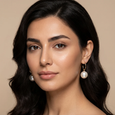 pearl-earrings-on-ear-women.jpg