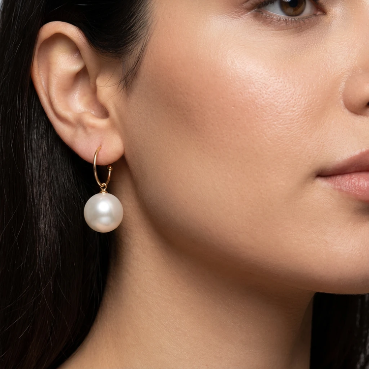pearl-earrings-on-ear-women.jpg